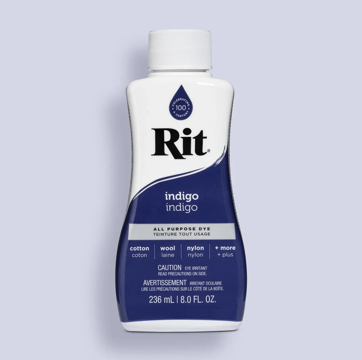 Bottle of Rit indigo all-purpose dye on a light gray background