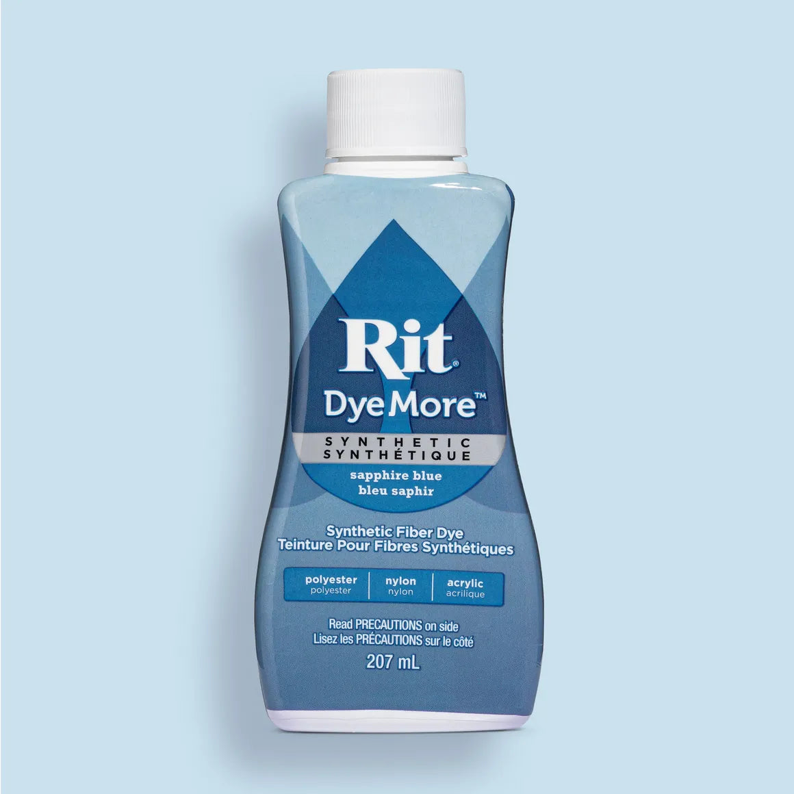 Bottle of Sapphire Blue Rit DyeMore synthetic fiber dye on a light blue background