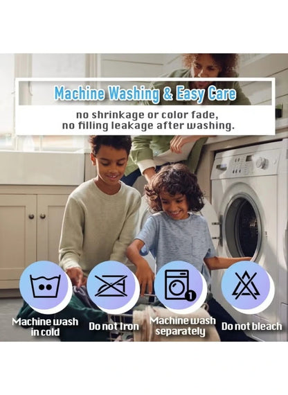 Kids putting a quilted mattress protector in a washing machine