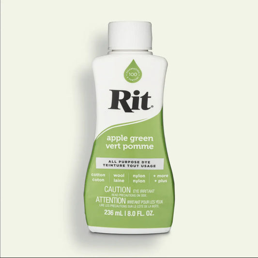 Rit all purpose dye bottle in apple green color on a light beige background