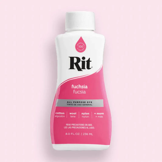 Bottle of Rit fuchsia all-purpose dye on a pink background