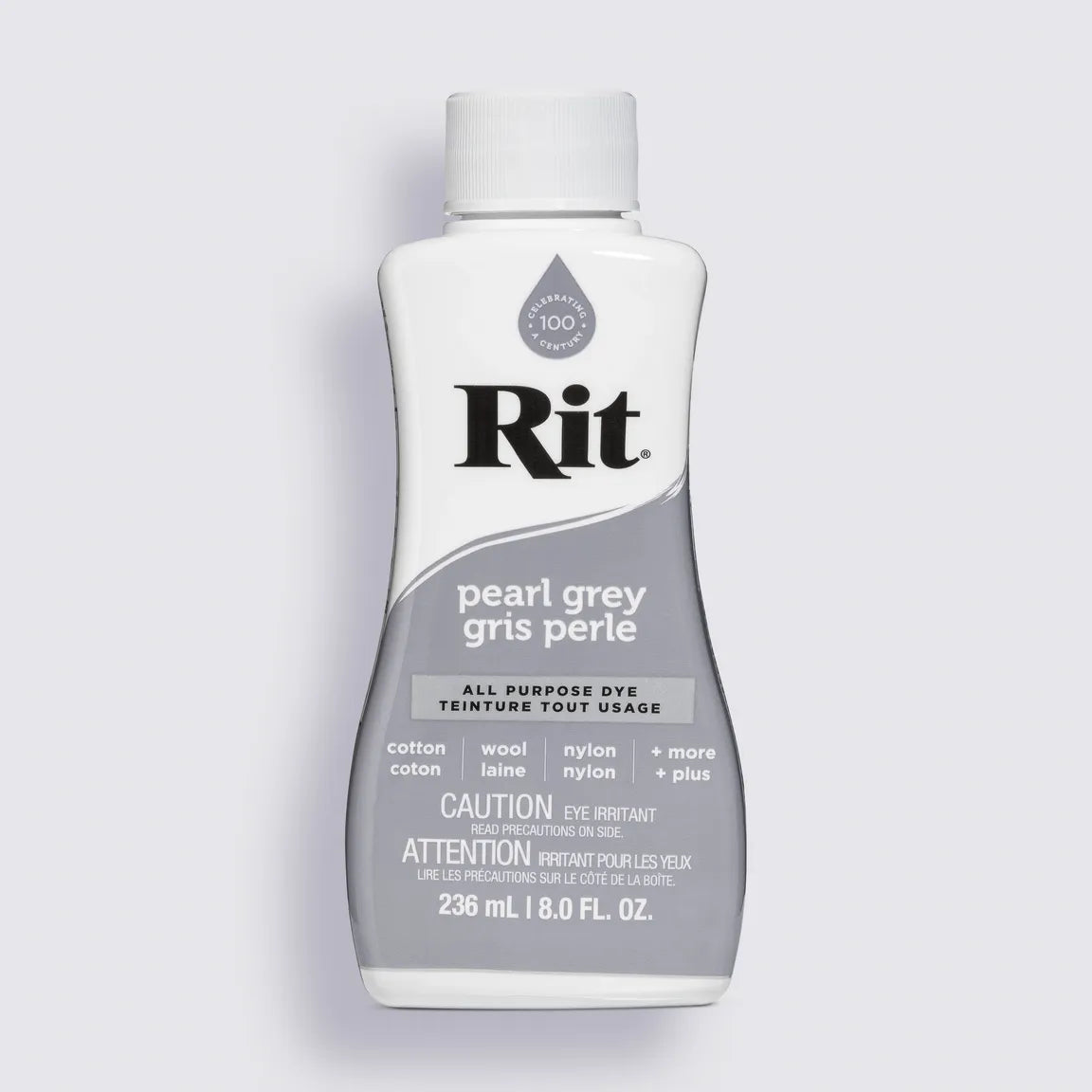 Rit dye bottle in pearl grey color on a light gray background