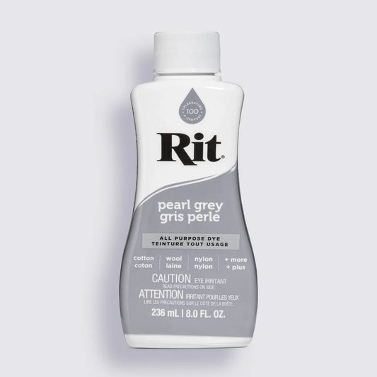 Rit dye bottle in pearl grey color on a light gray background