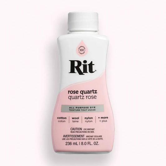 Bottle of Rit dye in rose quartz color on a white background
