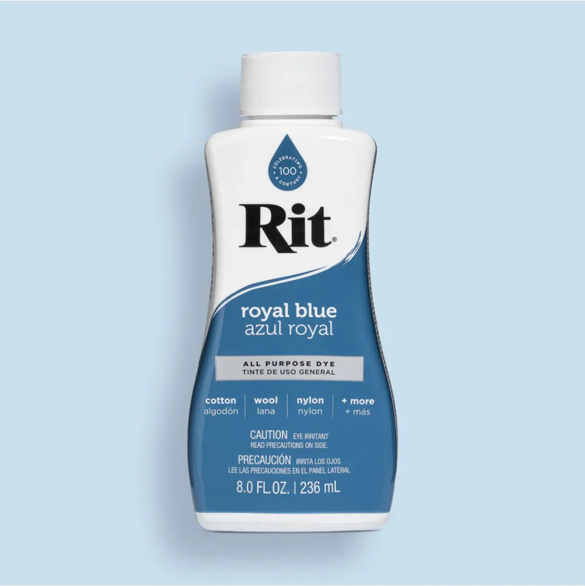 Bottle of Rit all-purpose dye in royal blue on a light blue background
