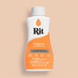 Rit dye bottle with tangerine color on a beige background