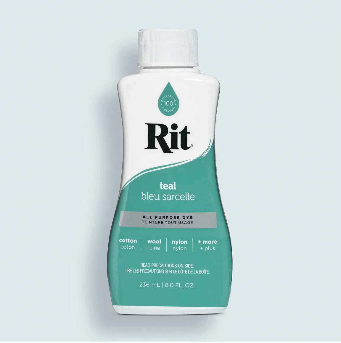 Rit all-purpose dye bottle in teal color on a light gray background