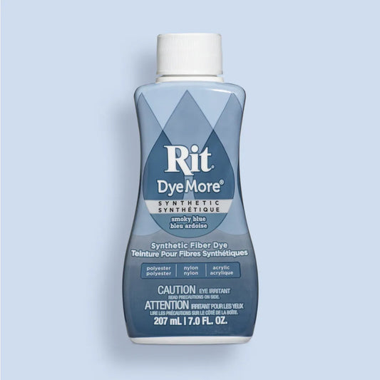 Smoky Blye Rit DyeMore synthetic fiber dye bottle on a light blue background